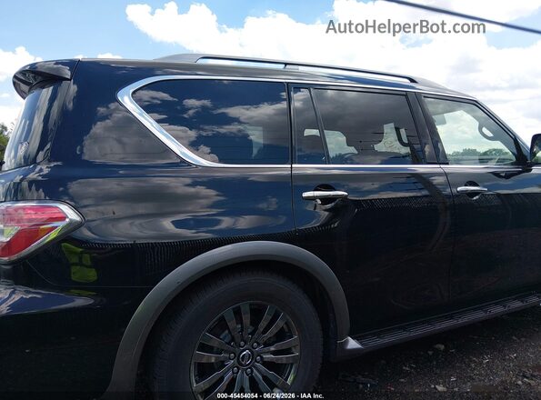 JN8AY2NEXJ9734112 2018 NISSAN ARMADA Черный Вид задней части салона
