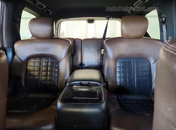 JN8AY2NEXJ9734739 2018 NISSAN ARMADA Black უკანა სავარძლების ხედი