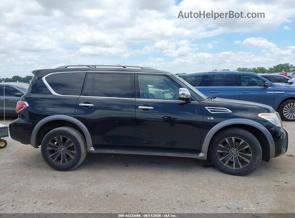 JN8AY2NF0J9330261 2018 NISSAN ARMADA Black Vista interior trasera