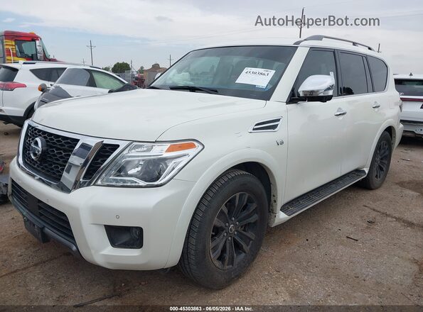 JN8AY2NF2L9360509 2020 NISSAN ARMADA White Vista tres cuartos delantera izquierda