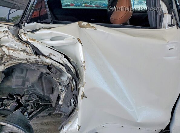 JTDACAAJ3S3024447 2025 TOYOTA CROWN White Vista de los asientos traseros