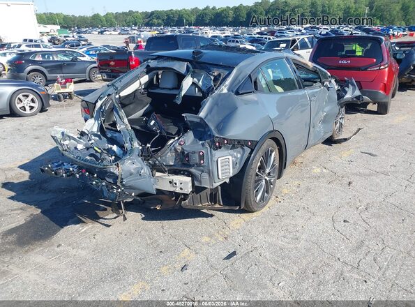 JTDACAAU0R3036348 2024 TOYOTA PRIUS Silver Trasero derecho