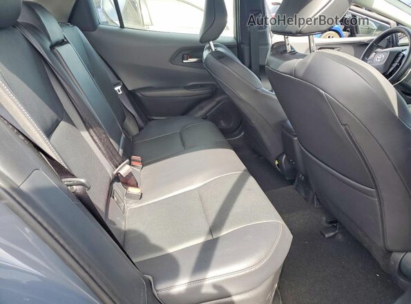 JTDACAAU1S3059613 2025 TOYOTA PRIUS Gray Vista de los asientos traseros