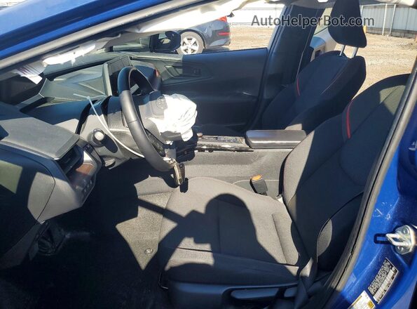 JTDACACU0R3030868 2024 TOYOTA PRIUS Blue Vista interior delantera