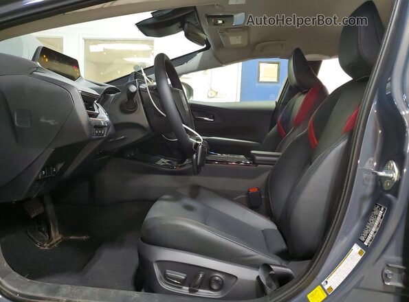 JTDACACU0S3049264 2025 TOYOTA PRIUS Gray Vista interior delantera