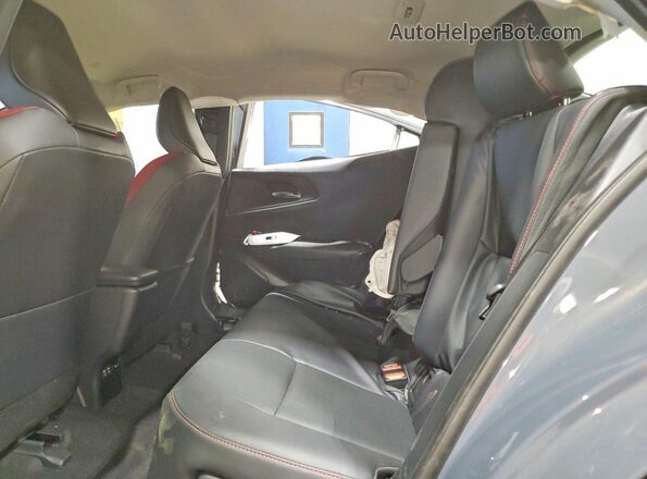 JTDACACU0S3049264 2025 TOYOTA PRIUS Gray Vista de los asientos traseros