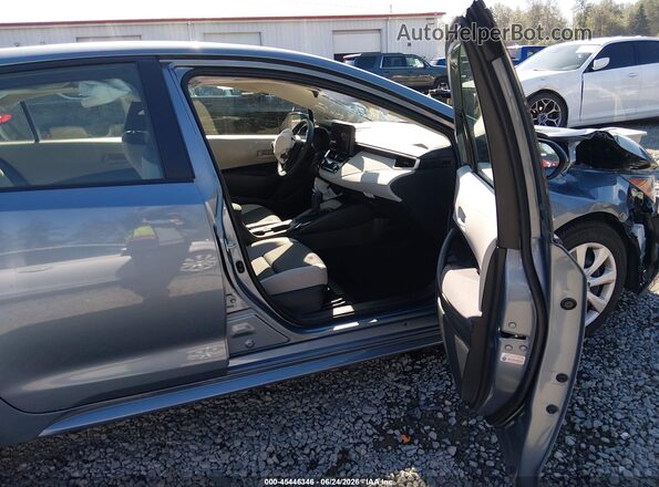 JTDB4MEE0T3033964 2026 TOYOTA COROLLA Silver Widok wnętrza z przodu