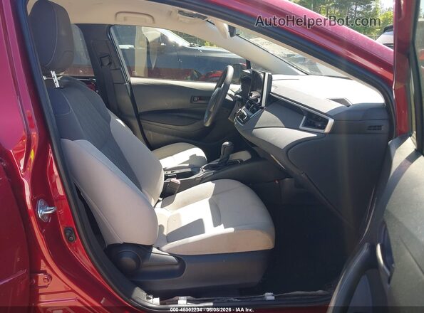 JTDB4MEE3T3043999 2026 TOYOTA COROLLA Red Front interior view