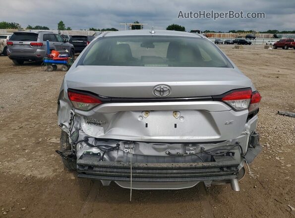 JTDB4MEE4RJ015634 2024 TOYOTA COROLLA Серебряный Вид сзади