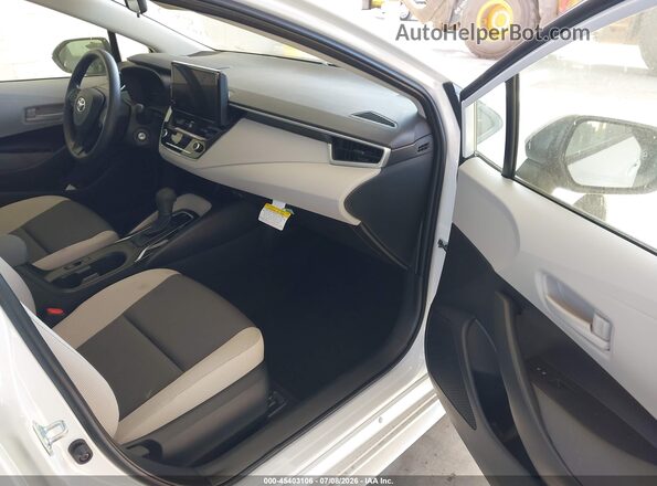 JTDB4MEE5T3041056 2026 TOYOTA COROLLA White Widok wnętrza z przodu