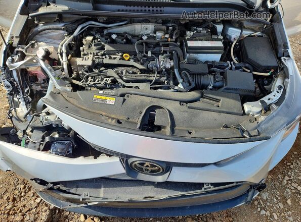 JTDB4MEE6P3014003 2023 TOYOTA COROLLA Silver Rear interior view