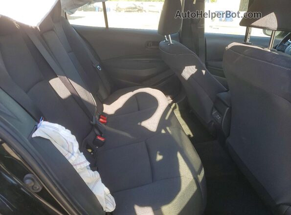 JTDB4MEE8P3013659 2023 TOYOTA COROLLA Black Rear seats view