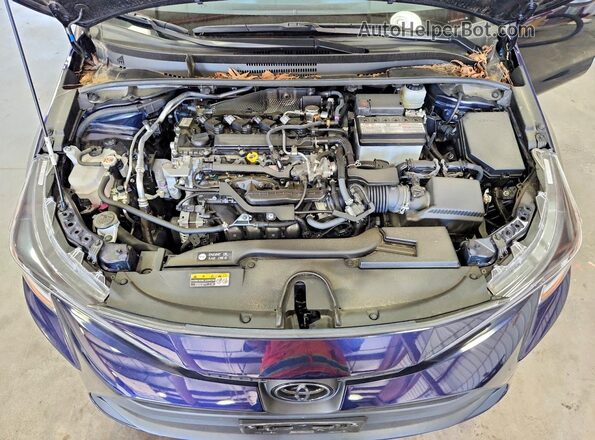 JTDB4MEE9PJ009616 2023 TOYOTA COROLLA Blue Rear interior view