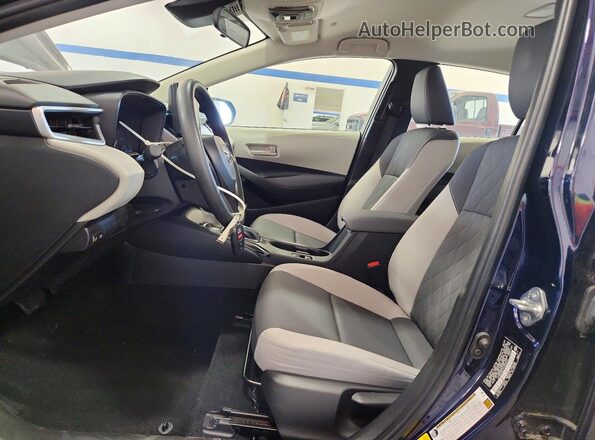 JTDB4MEE9PJ009616 2023 TOYOTA COROLLA Blue Front interior view
