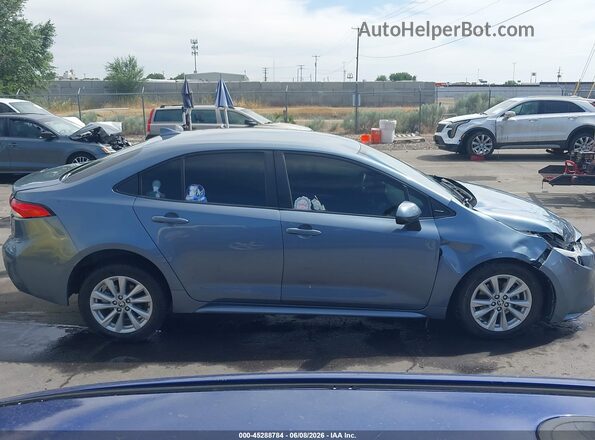 JTDBCMFE0P3009168 2023 TOYOTA COROLLA Blue Սալոնի հետևի տեսք