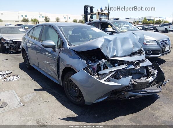 JTDBCMFE0T3128798 2026 TOYOTA COROLLA HYBRID Blue Սալոնի հետևի տեսք