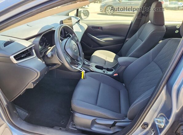 JTDBCMFE1PJ015556 2023 TOYOTA COROLLA Blue Vista interior delantera