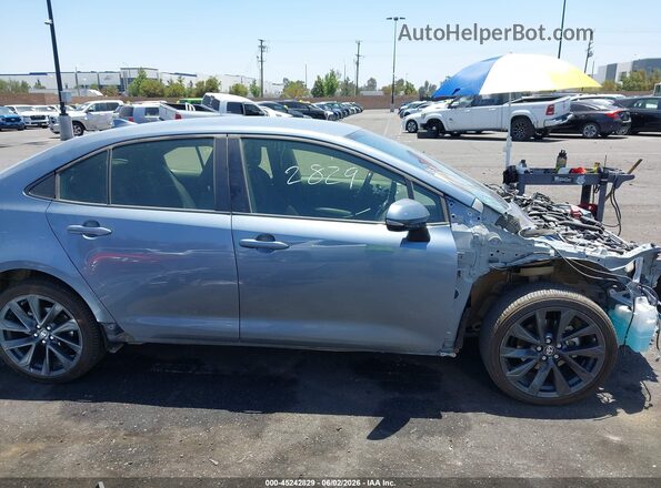 JTDBCMFE1R3034499 2024 TOYOTA COROLLA Light Blue 360 interior view