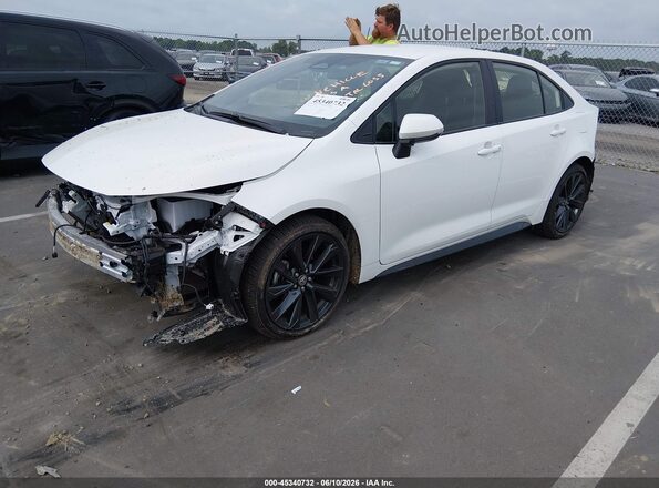 JTDBCMFE1T3131015 2026 TOYOTA COROLLA HYBRID White Vista tres cuartos delantera izquierda