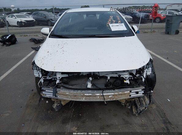 JTDBCMFE1T3131015 2026 TOYOTA COROLLA HYBRID White Vista interior trasera