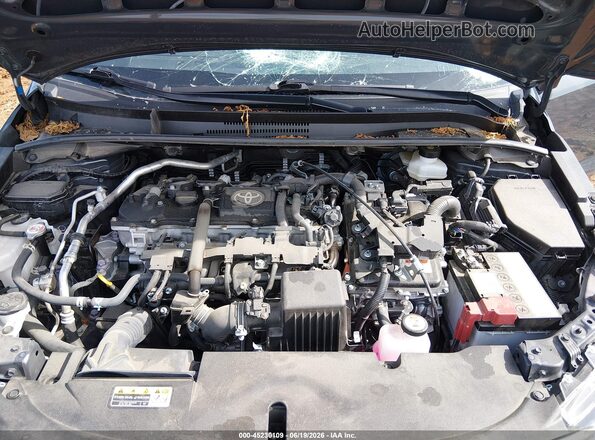 JTDBCMFE2S3086083 2025 TOYOTA COROLLA Gray Rear view