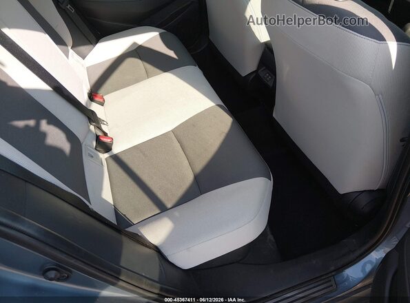 JTDBCMFE2S3097424 2025 TOYOTA COROLLA Blue Vista de la etiqueta del VIN