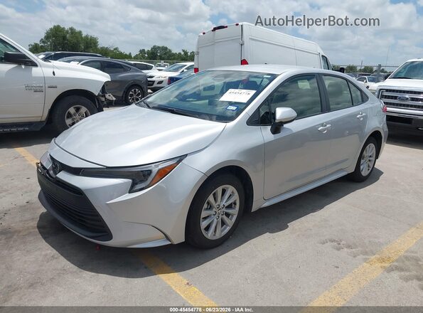 JTDBCMFE2T3113042 2026 TOYOTA COROLLA HYBRID Silver Առջևի ձախ երեք քառորդ տեսարան