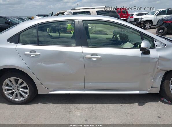 JTDBCMFE2T3113042 2026 TOYOTA COROLLA HYBRID Silver Սալոնի հետևի տեսք