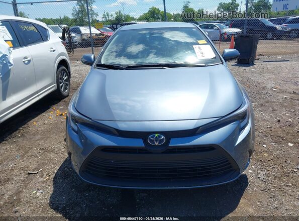 JTDBCMFE3S3069373 2025 TOYOTA COROLLA Light Blue Vista interior trasera