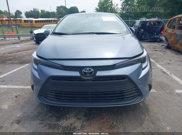 JTDBCMFE3T3117746 2026 TOYOTA COROLLA HYBRID Light Blue Вид задньої частини салону