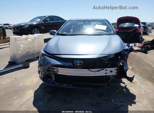 JTDBCMFE4T3133678 2026 TOYOTA COROLLA HYBRID Light Blue Вид задньої частини салону