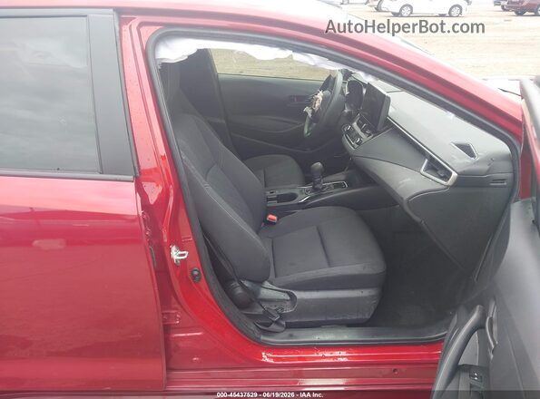 JTDBCMFE5T3124553 2026 TOYOTA COROLLA HYBRID Maroon Вид салону спереду