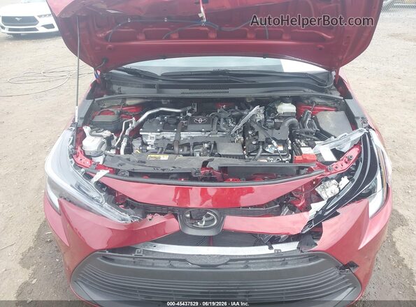 JTDBCMFE5T3124553 2026 TOYOTA COROLLA HYBRID Maroon Вид ззаду