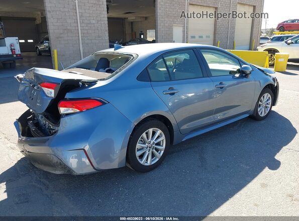 JTDBCMFE5T3142082 2026 TOYOTA COROLLA HYBRID Light Blue Trasero derecho