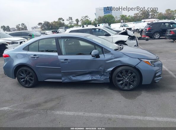 JTDBCMFE6T3141166 2026 TOYOTA COROLLA HYBRID Синий Вид задней части салона