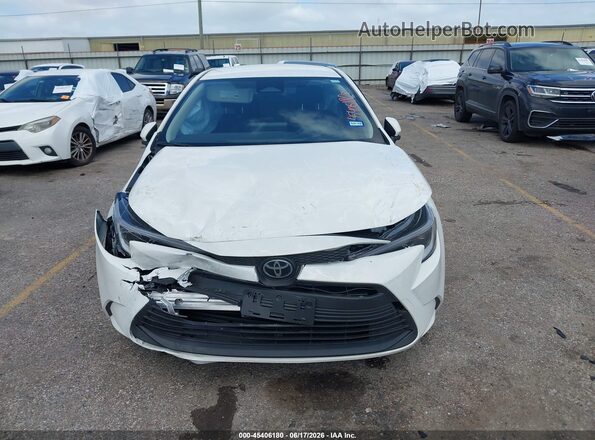 JTDBCMFE7T3138793 2026 TOYOTA COROLLA HYBRID White Սարքավորումների վահանակի տեսք