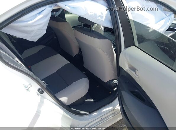 JTDBCMFE7T3138793 2026 TOYOTA COROLLA HYBRID White VIN կոդի պիտակի տեսք
