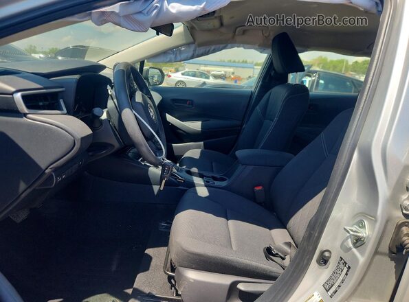 JTDBCMFE8S3099162 2025 TOYOTA COROLLA Silver Front interior view