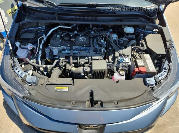 JTDBCMFE8T3113336 2026 TOYOTA COROLLA Blue Rear interior view