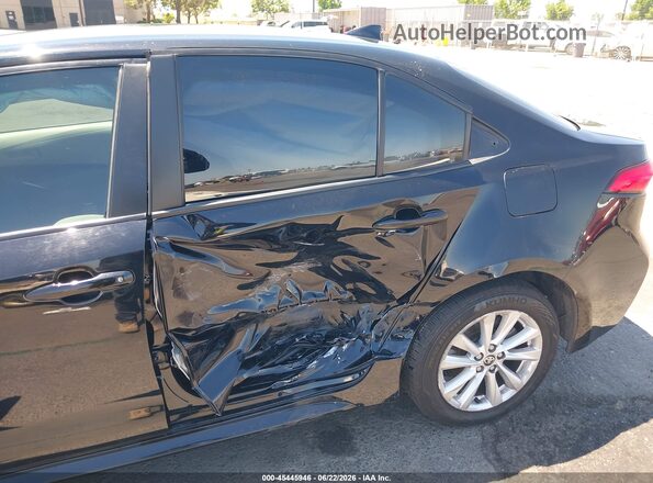 JTDBCMFE9PJ003512 2023 TOYOTA COROLLA Black წინა ხედი