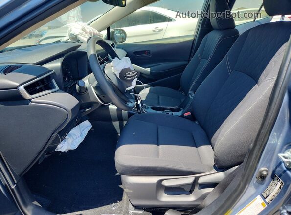 JTDBCMFEXR3028944 2024 TOYOTA COROLLA Silver Front interior view
