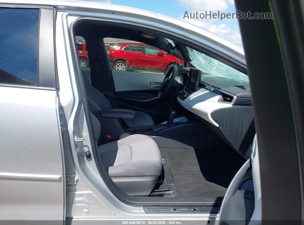 JTDBDMHE0PJ000640 2023 TOYOTA COROLLA Silver წინა სალონის ხედი