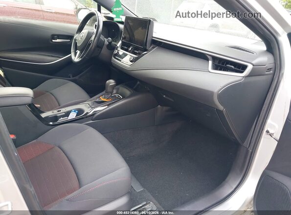 JTDBDMHE2PJ001451 2023 TOYOTA COROLLA Серебряный Вид салона спереди