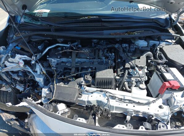 JTDBDMHE3S3020622 2025 TOYOTA COROLLA Silver Rear view