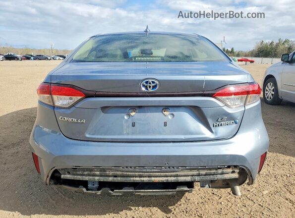 JTDBDMHE4P3005151 2023 TOYOTA COROLLA Silver Rear view