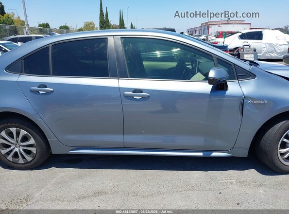 JTDEAMDEXMJ032793 2021 TOYOTA COROLLA Light Blue Սալոնի հետևի տեսք