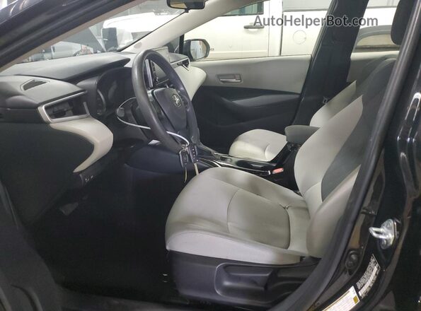 JTDEPMAE0MJ143940 2021 TOYOTA COROLLA Black Front interior view