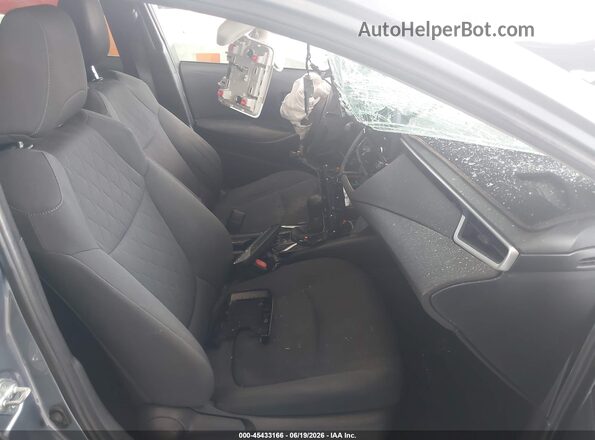 JTDEPMAEXMJ170238 2021 TOYOTA COROLLA Light Blue Вид салона спереди