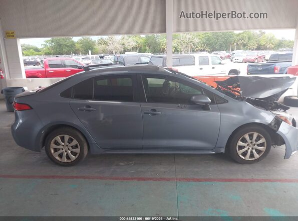 JTDEPMAEXMJ170238 2021 TOYOTA COROLLA Light Blue Вид задней части салона