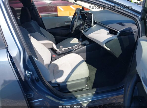 JTDEPRAE2LJ071327 2020 TOYOTA COROLLA Light Blue Front interior view